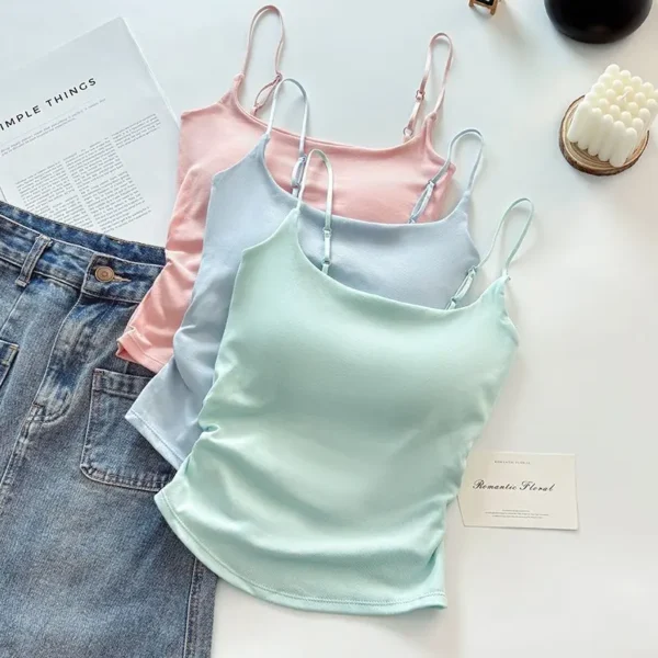 Backless tank top women to be worn as a layer or as an outer garment Features a padded collar and pleated design stylish look